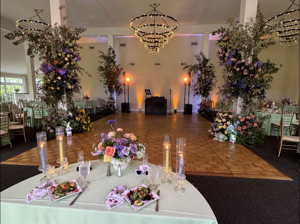 Wedding reception at Springfield Manor with elegant lighting and a lively dance floor