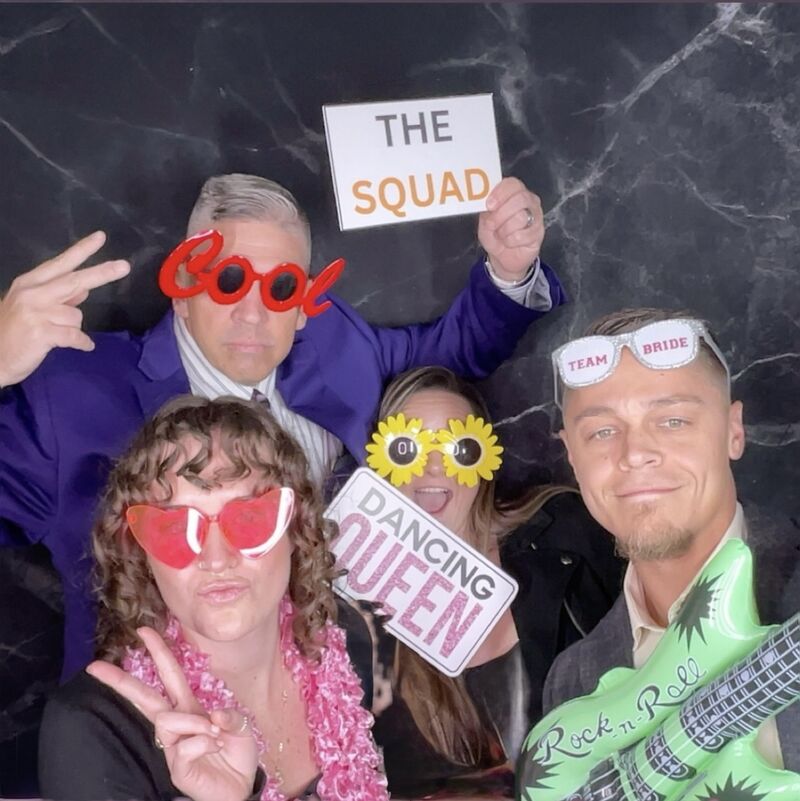 Photo booth group shot with props